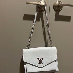 Louis Vutton Baby blue bag with box and bag.